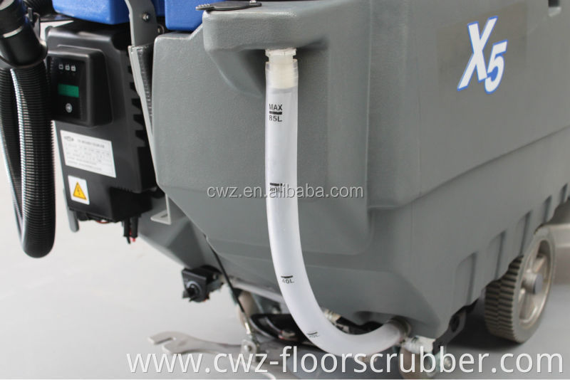 Automatic hand held floor tile cleaning machine